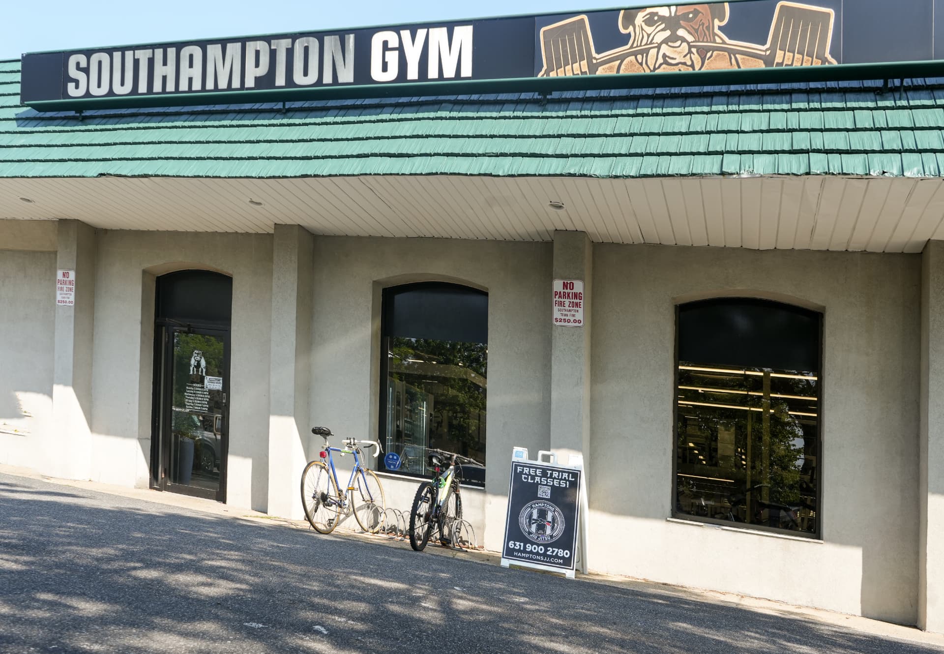 Southampton Gym exterior on a clear summer morning with bikes parked outside