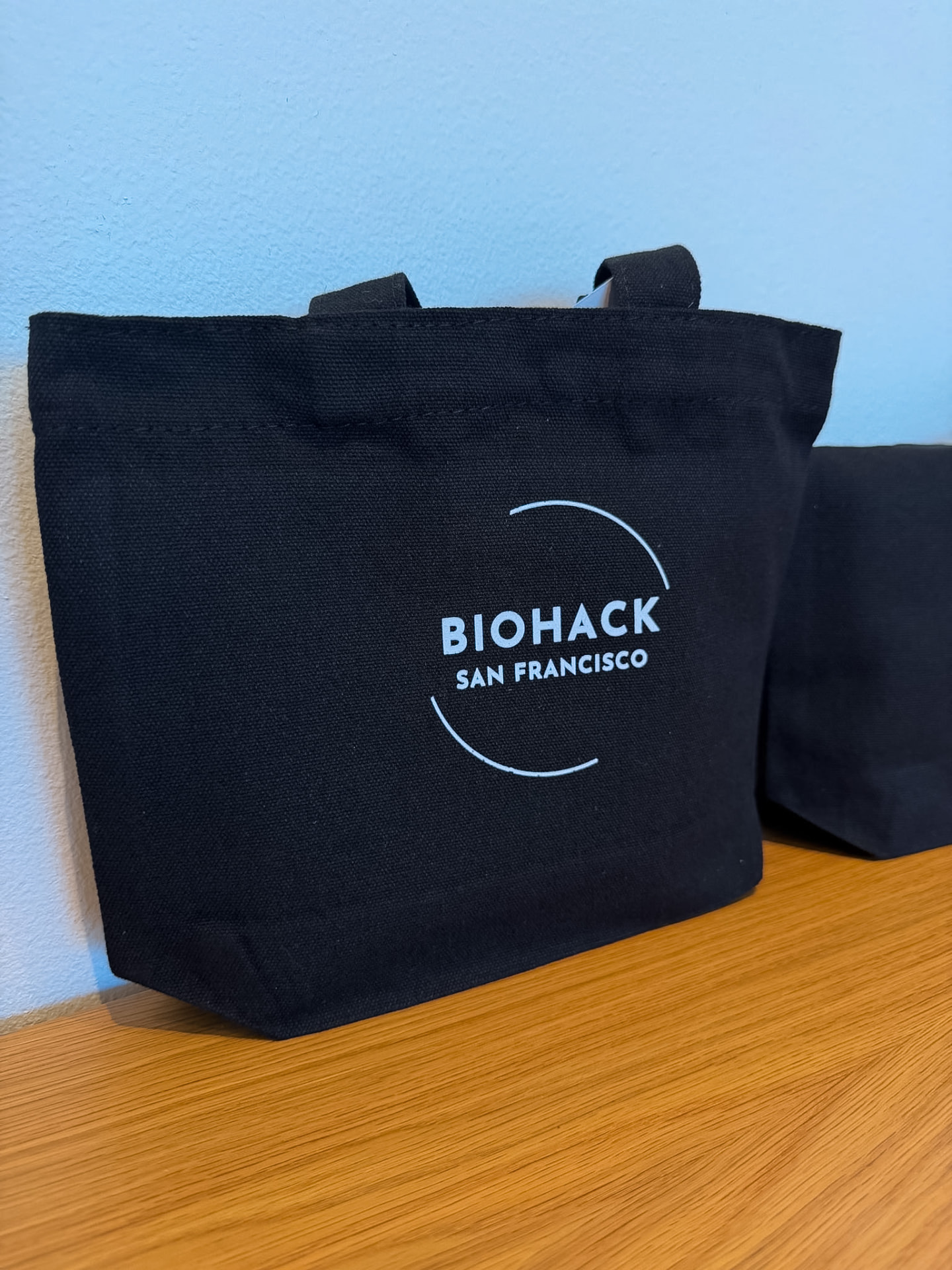 BioHack San Francisco tote bags at the event