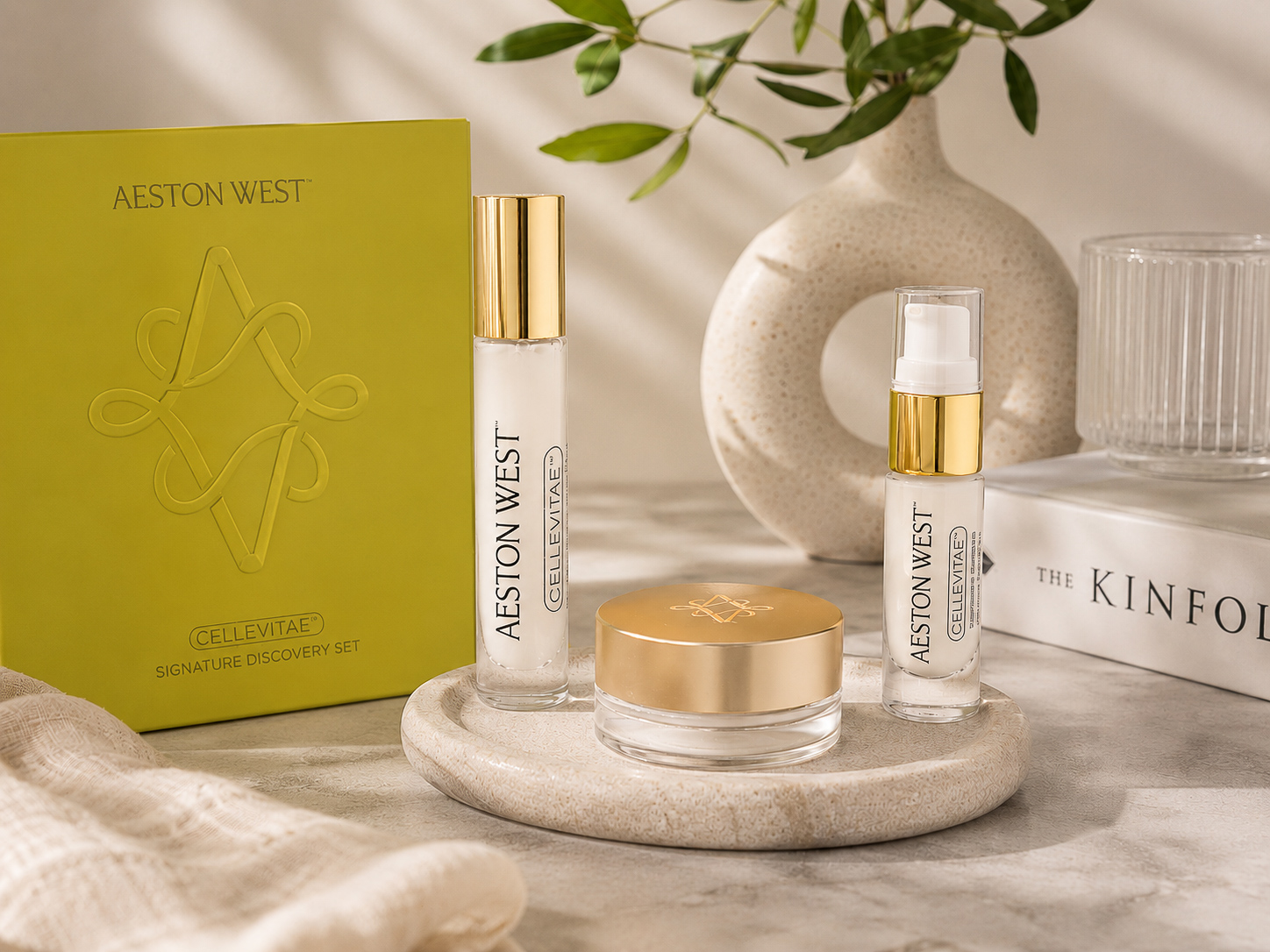 Aeston West Cellevitae discovery set styled on a marble tray in soft daylight